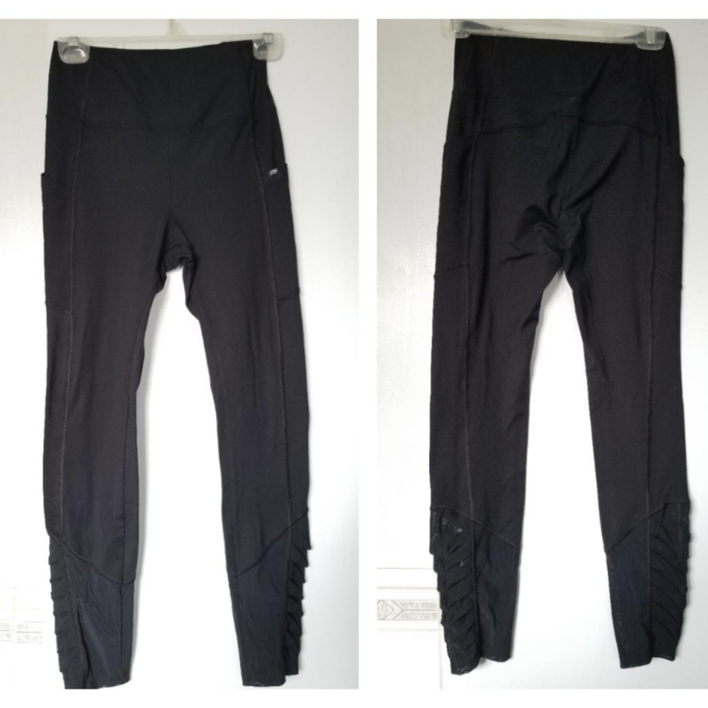 Black leggings with sheer ruffled ankles